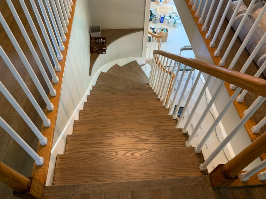 Natural oak stairs with curved landing