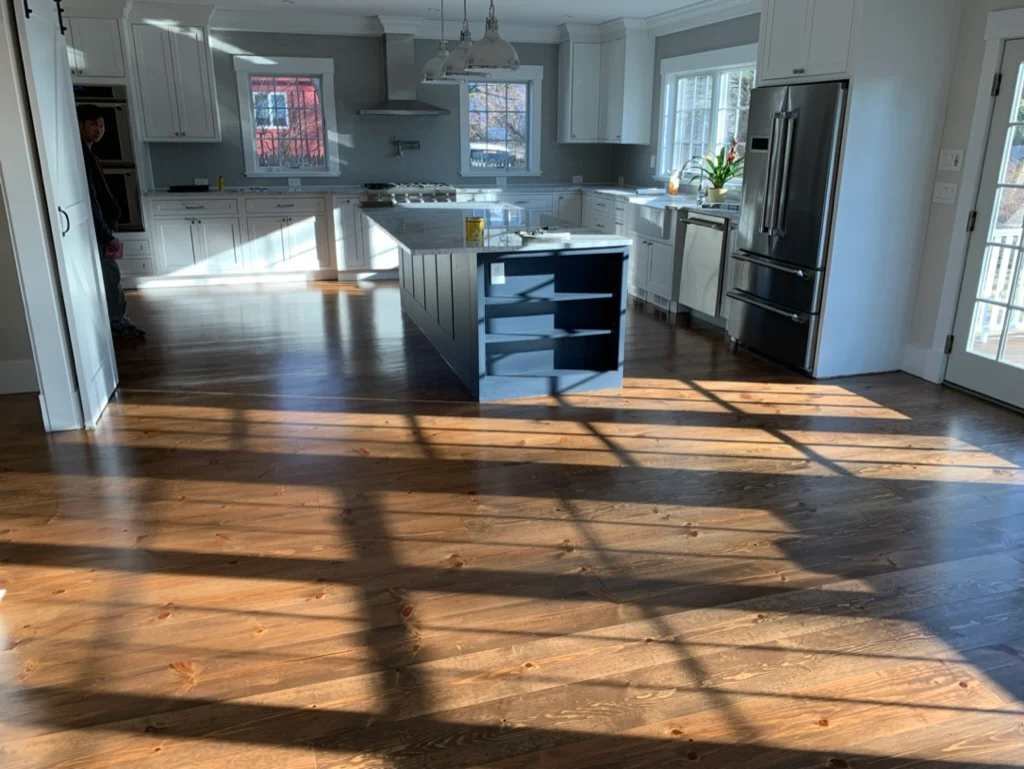Open living space with oak flooring
