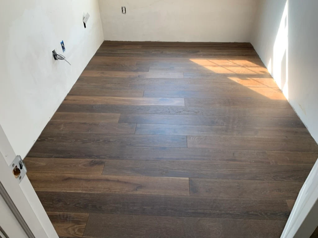 Dark stained bedroom floor