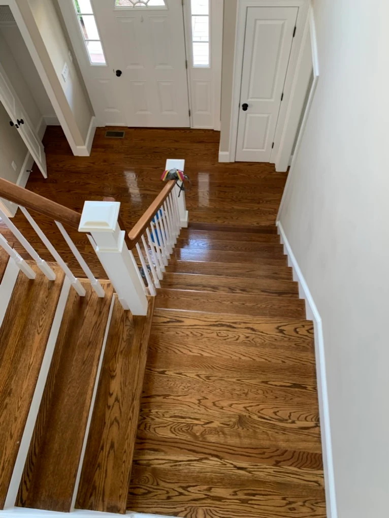 Staircase with mixed wood tones