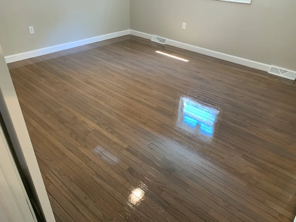 Medium-dark walnut stained empty residential room