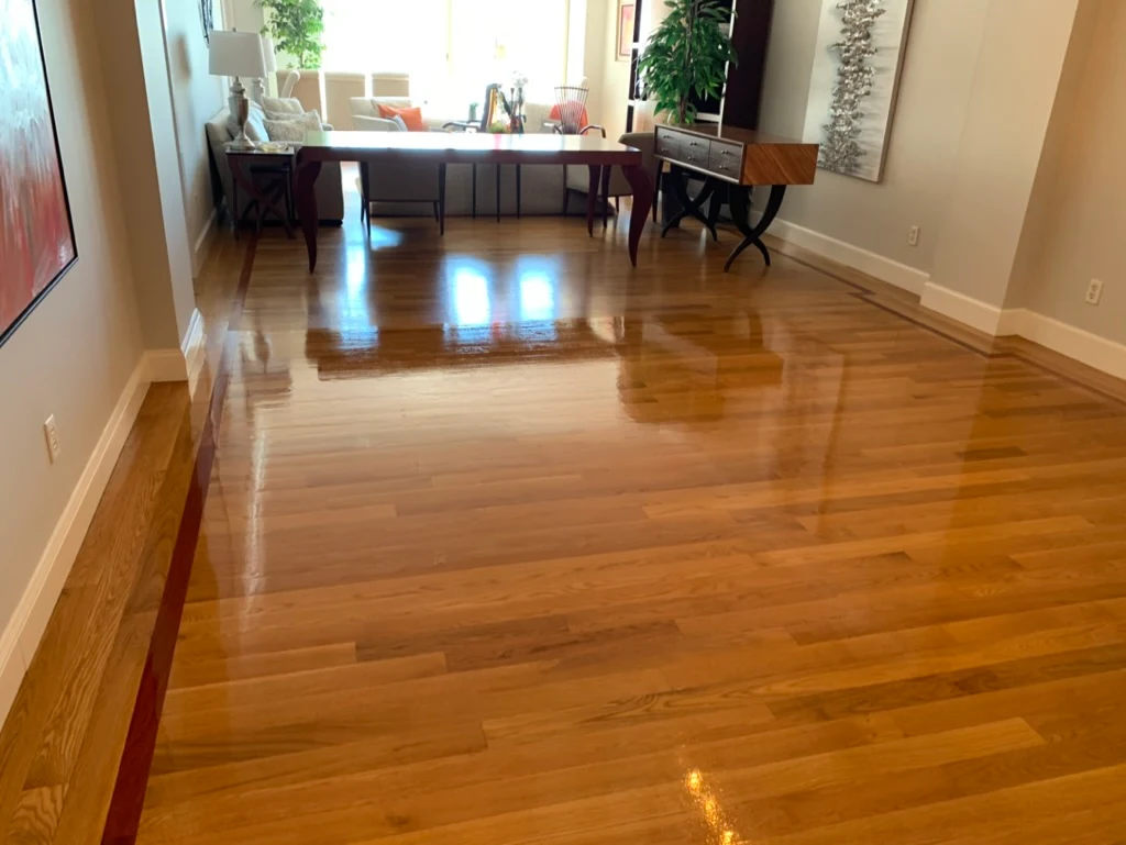 Dark stained floor in living room with furniture