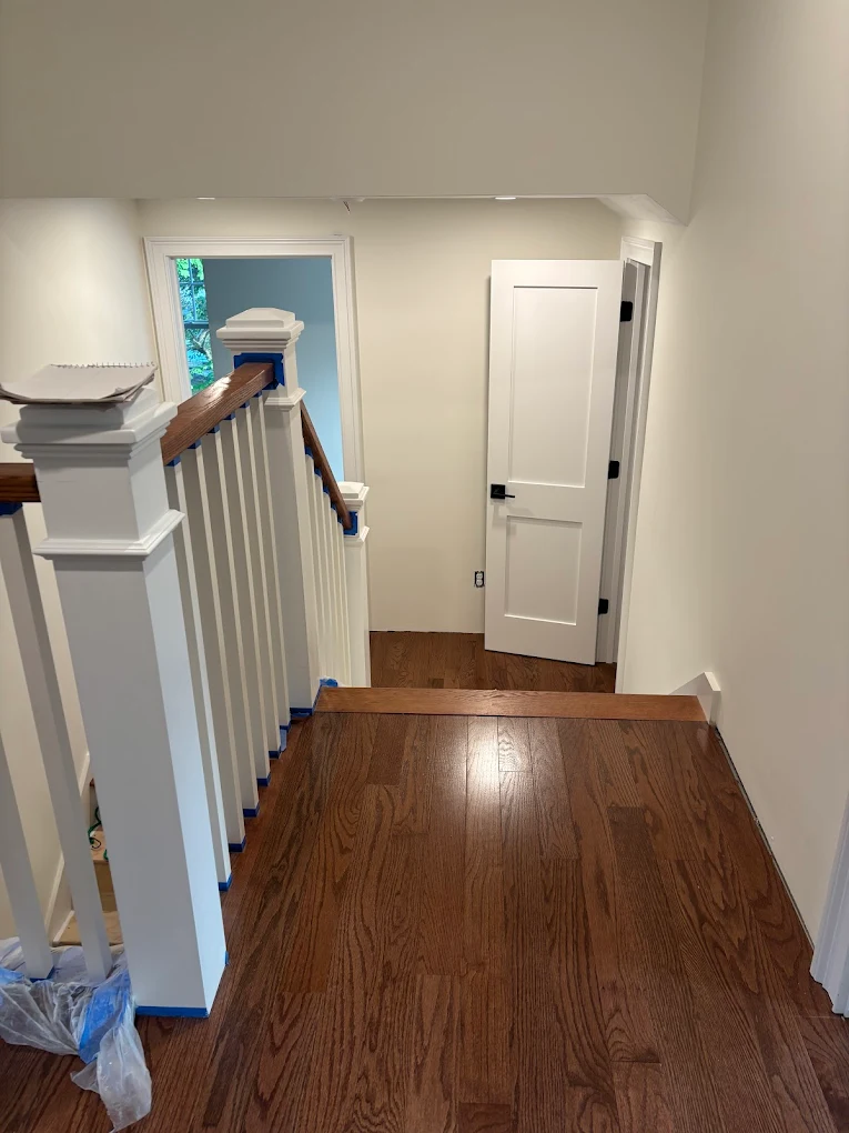 Refinished staircase with hardwood floor