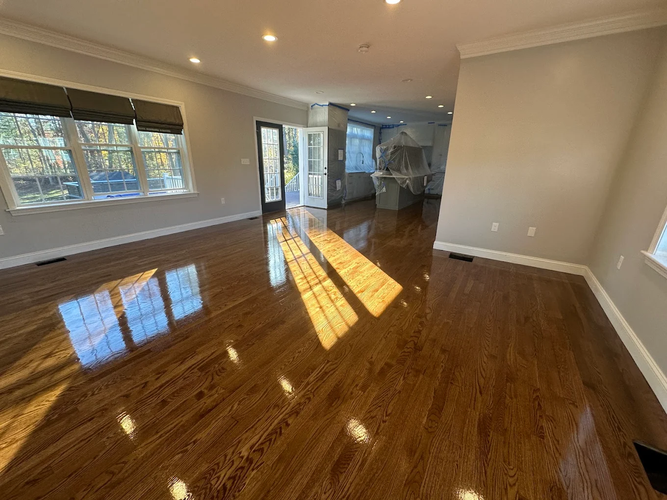 Warm oak hardwood in bright space